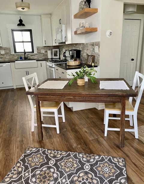 Vintage kitchen table seats four.