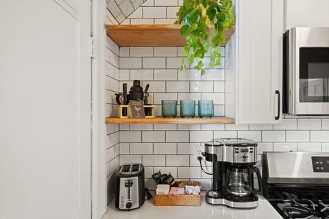 Kitchen equipped with coffee maker, toaster, blender and more!