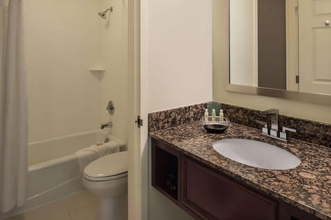 Full bathroom with a shower/tub. Basic toiletries and towels are provided