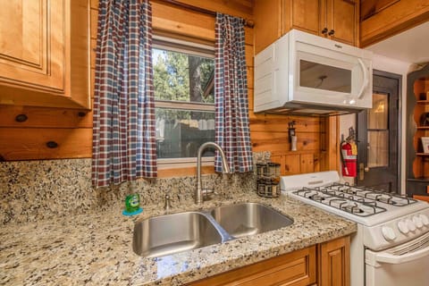 Kitchen window with views of the pines