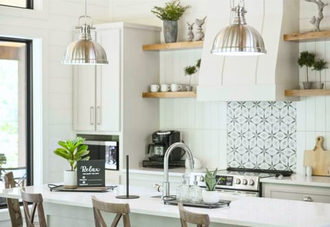 Start your day in this bright and welcoming kitchen. It's the perfect spot for a peaceful morning coffee.