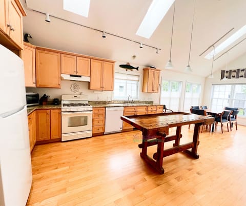 Kitchen with open living and dining area. - Kitchen with open living and dining area.