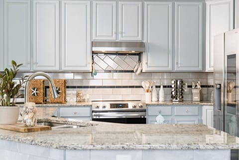 Open concept living room, dining and full kitchen