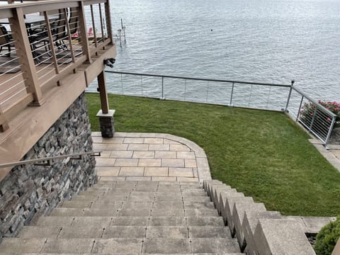 The steps going from the parking area to the lake, patio, hot tub, fire pit.