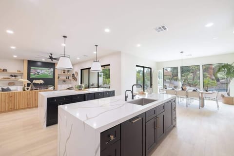 Open-concept kitchen and dining area with space for entertaining.