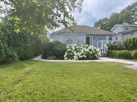 View of the cottage across from the lake
