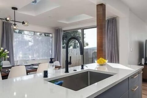 Kitchen also adjacent to the dining room.