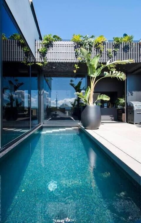 Pool is 1.8M deep in middle so its possible to dive. 1.2M deep at the ends with steps for easy exit.

Heats up circa 27 degrees with swim jets for the never ending workout