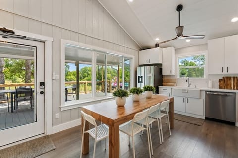 Gather to eat overlooking the deck, pool, and pond.