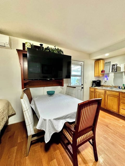 Nice dining table and work space with smart TV