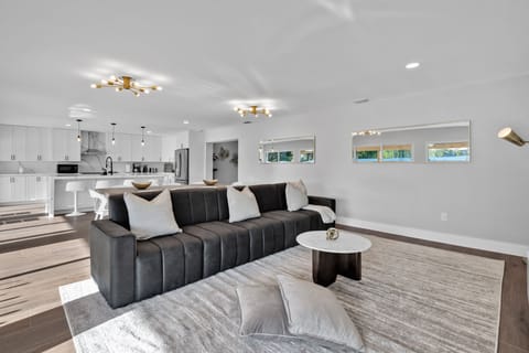 The natural light floods in through the glass doors providing a warm atmosphere