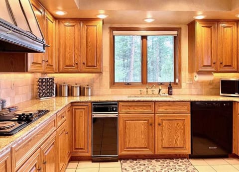 Large gathering Kitchen with bar and dining area