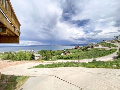 Stunning panoramic lake views from the driveway—your mountain escape begins the moment you arrive.