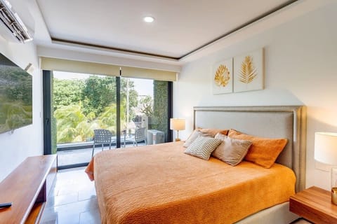 Enjoy a king size bed, access to the balcony and lots of natural light