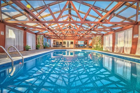 Welcome to The Pool House! This room is enclosed and attached to the home.