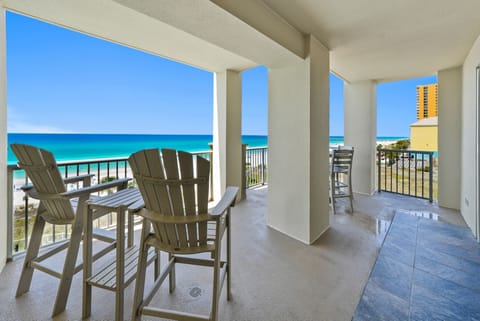 Your private balcony frames stunning turquoise waters where you'll sip morning coffee and watch endless ocean views unfold.