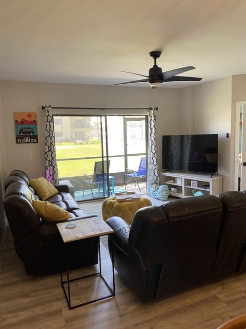 Spacious floor plan right out to our screened in patio that leads to the beach