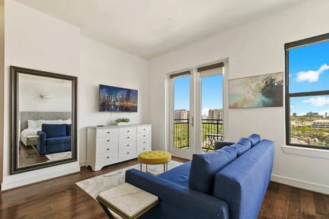  Bright space with stunning views, stylish decor, and a fun yellow accent table!