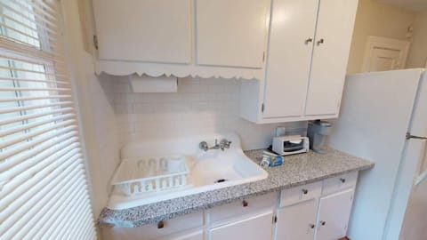 Kitchen includes Keurig and Pods, toaster oven, tea pot, fresh sponge, and dishes. Please note: there is now a microwave (not pictured)