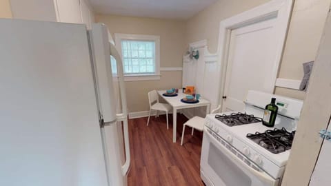 We have plates, bowls, mugs, flatware, and cups for four! Plus a frying pan and two pots. Need a toaster oven or tea kettle (not pictured)? We've got you covered. You also have a full size fridge and gas stove. You're all set!