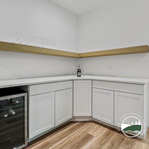 Extra bar space and wine fridge to keep the party going on both levels