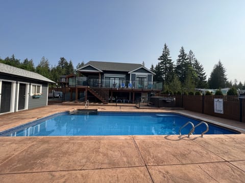 Poolside view of of the house and deck