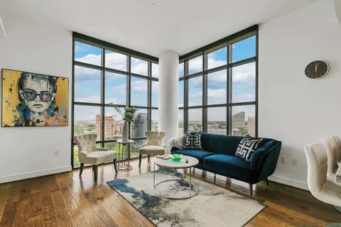 Bright views and vibrant artwork create an inviting space to unwind or gather!