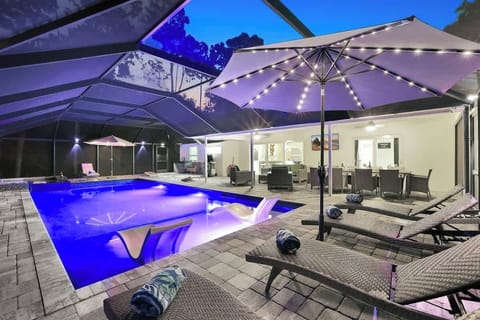 With more than enough room for activities, our backyard boasts a HEATED saltwater pool/spa, grilling area, large dining table, hangout area, TV, corn hole, & sun loungers for you and your family to enjoy! A key aspect to an UNFORGETTABLE vacation!
