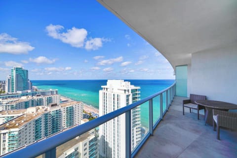 Panoramic balcony view of coast and ocean 🌊
