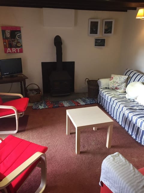 The comfortable TV room is a good place to relax.