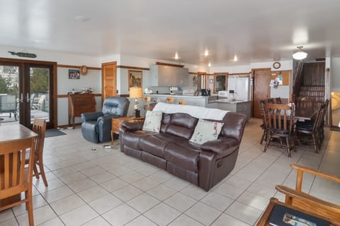 Make meals in the fully-stocked, open kitchen, then dine at the huge table for 8 