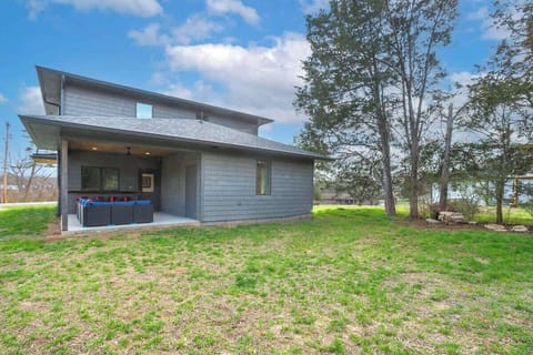 Discover the joys of our expansive backyard, a vast open canvas ideal for lawn games and limitless outdoor fun!