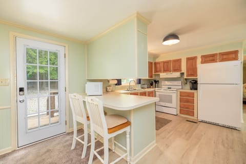 Spacious and fully furnished kitchen with modern appliances