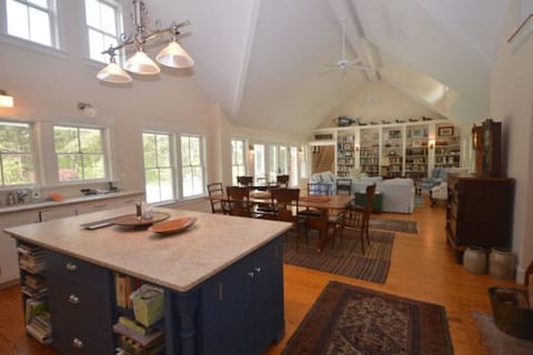 Chef`s kitchen and living/dining room with sliders to deck, pool 