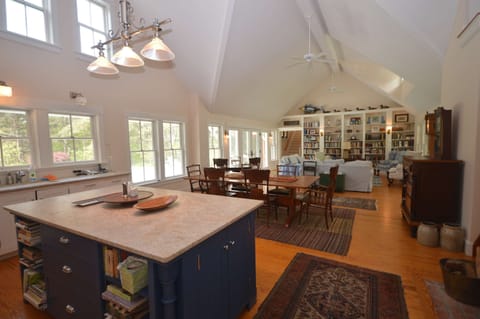 Chef`s kitchen and living/dining room with sliders to deck, pool
