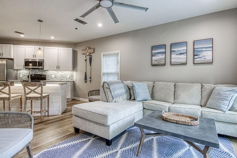 open floor plan with large sectional sofa