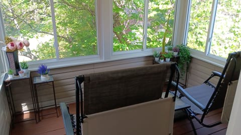 Master bedroom has private 2nd floor sunroom overlooking a beautiful greenspace.