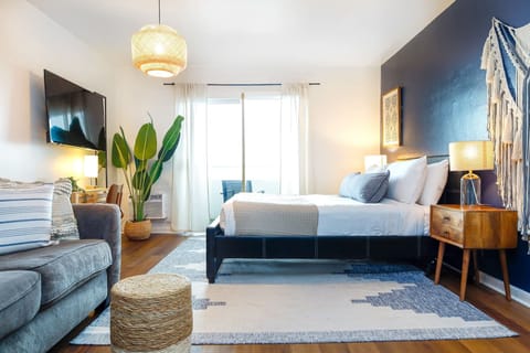 Relax in our stylish living room, a cozy spot that perfectly captures the essence of Miami living.