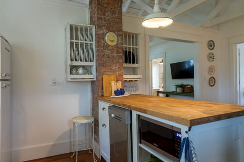 Kitchen includes dishwasher and microwave.