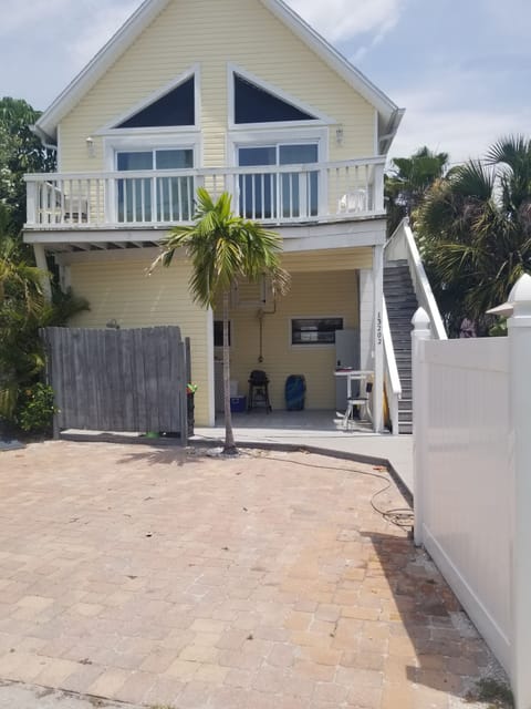 Back of the house with parking for 2 cars