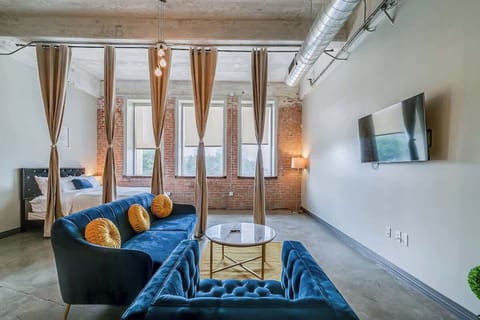Relax in style with vibrant decor and beautiful city views!