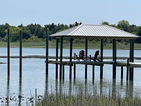 Sit on the dock and watch the tide roll in and out. 