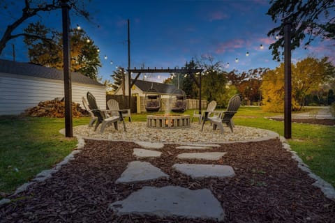 Massive smokeless fire pit with 2 comfy egg chairs, plenty of seating space, and firewood provided free from your host!