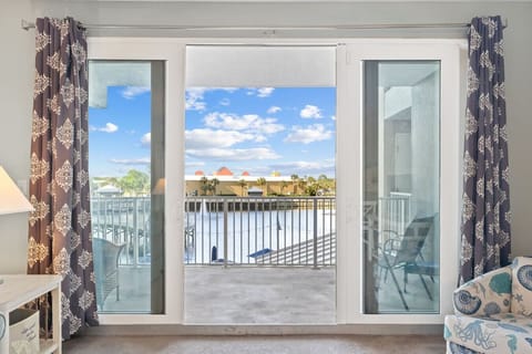 Direct Access from the Living Area to the Furnished Balcony with Lake Views and Light Show Views