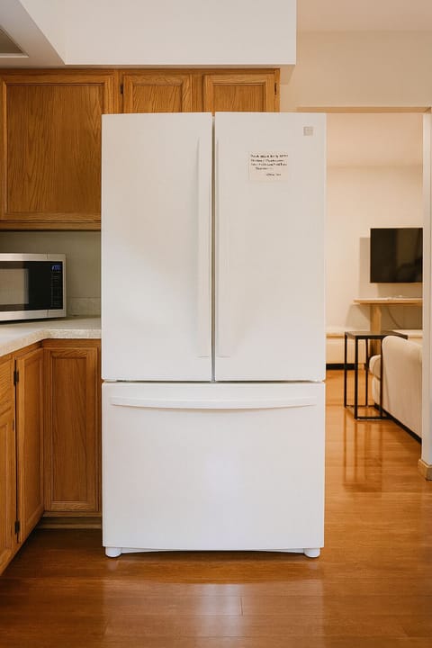 Extra refrigerator in the garage.