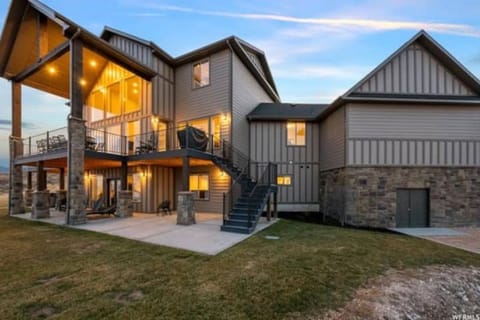 View of the back yard and rear of the house.