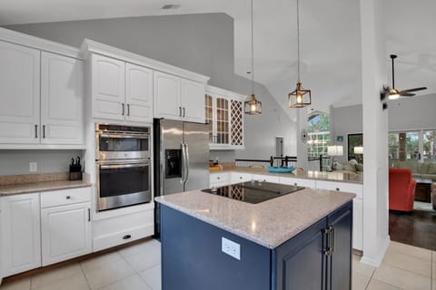 Kitchen featuring new stainless steel GE  & Kitchenaid appliances