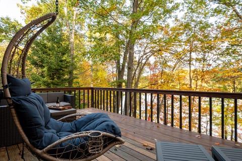 Sit back and relax as you watch the waves roll in at this lux lakefront home. 