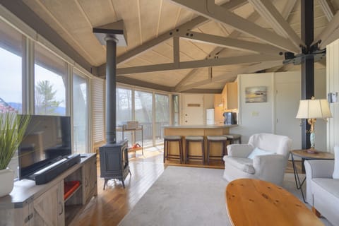 View of the living area connecting to the kitchen. 