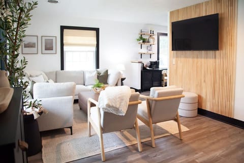 Modern, chic, and designed for connection — unwind in this light-filled living room where every detail blends style, warmth, and comfort. Perfect for wine country weekends or cozy nights in.
